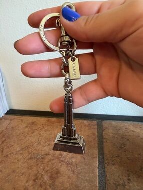 Coach Silver-tone Empire Tower Keychain with Branded Tag